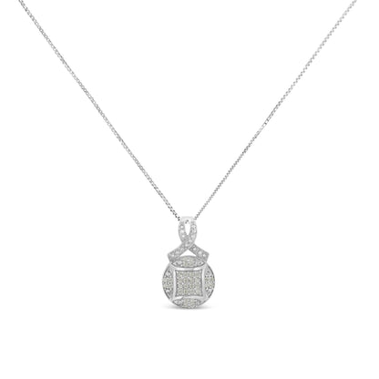 Front view of a white metal necklace with a round pendant featuring an intricate design set with white round pave-set gemstones.