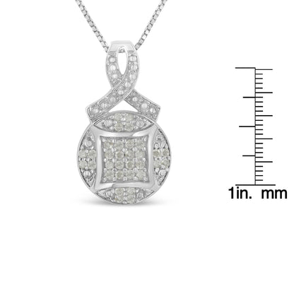 Front angle of white metal necklace with a pendant featuring round pave-set white gemstones, shown with ruler for size reference.