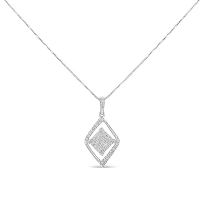 Front view of white metal necklace with a diamond-shaped pendant featuring round prong-set white gemstones around the outer frame and princess channel-set white gemstones in the center.