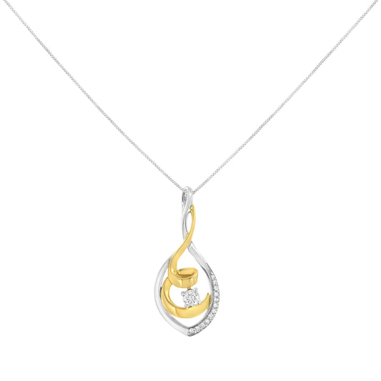 Front view of a two-tone yellow and white metal necklace pendant featuring a swirl design with multiple small white gemstones in prong settings along one side and one larger white gemstone in the center.