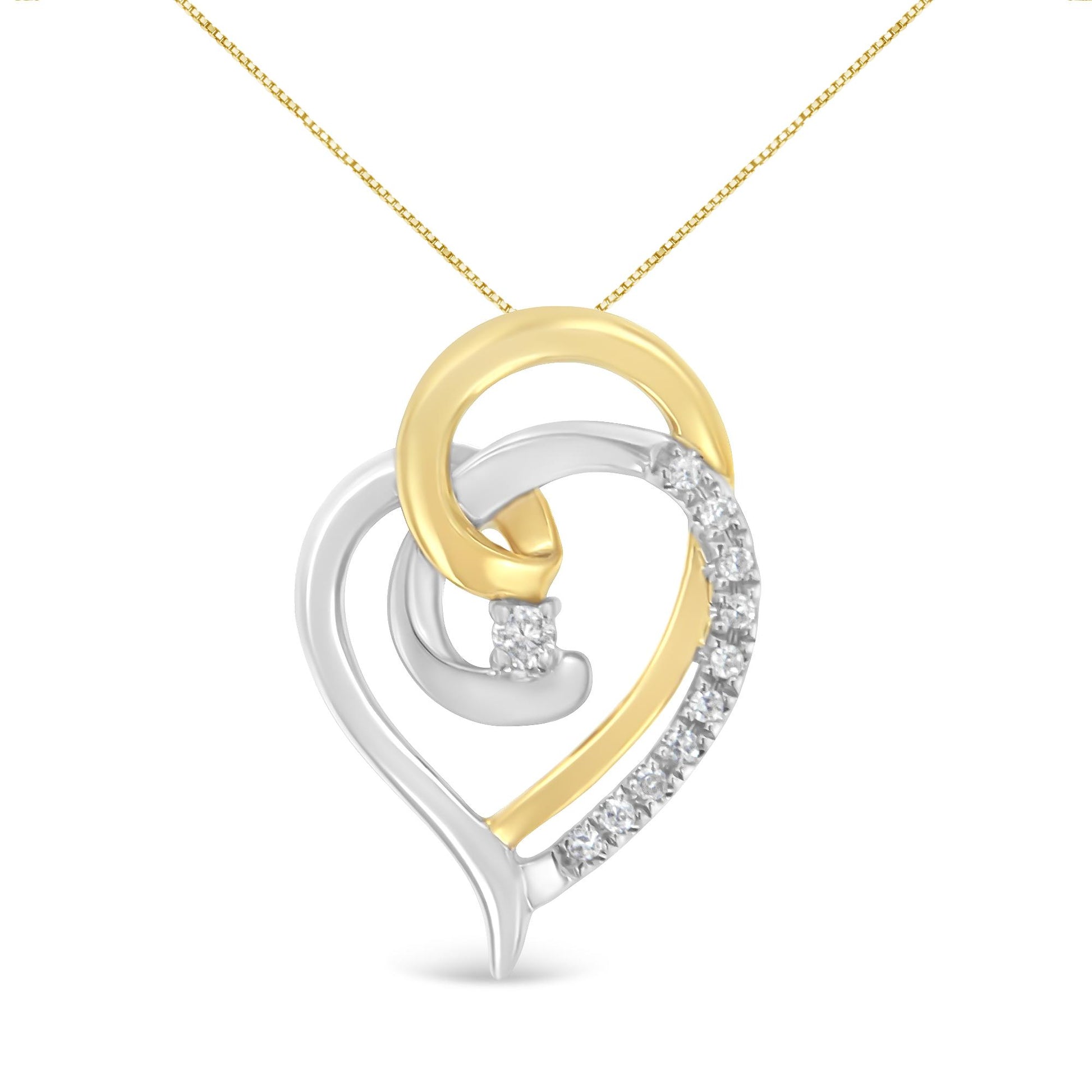 Two-toned heart-shaped necklace pendant with round white gemstones in prong settings, shown in a front-facing close-up angle.