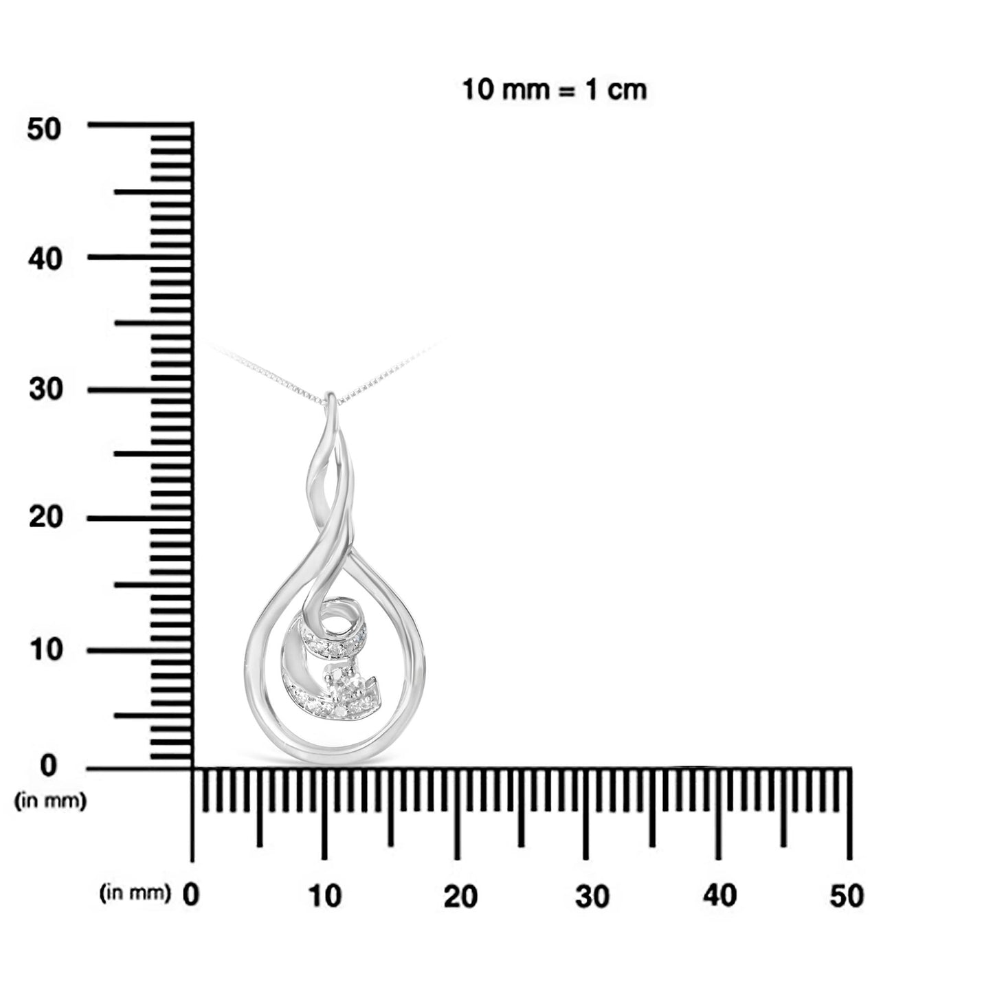 White metal necklace pendant with an abstract teardrop design and multiple round white gemstones, shown on a ruler for size reference, front view.