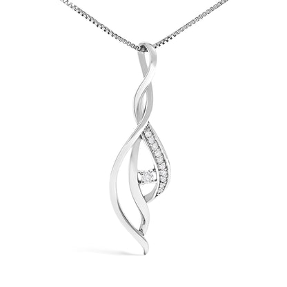 Close-up front view of a white metal necklace pendant with a twisted design featuring one central round white gemstone in prong setting and a row of smaller round white gemstones along one side.