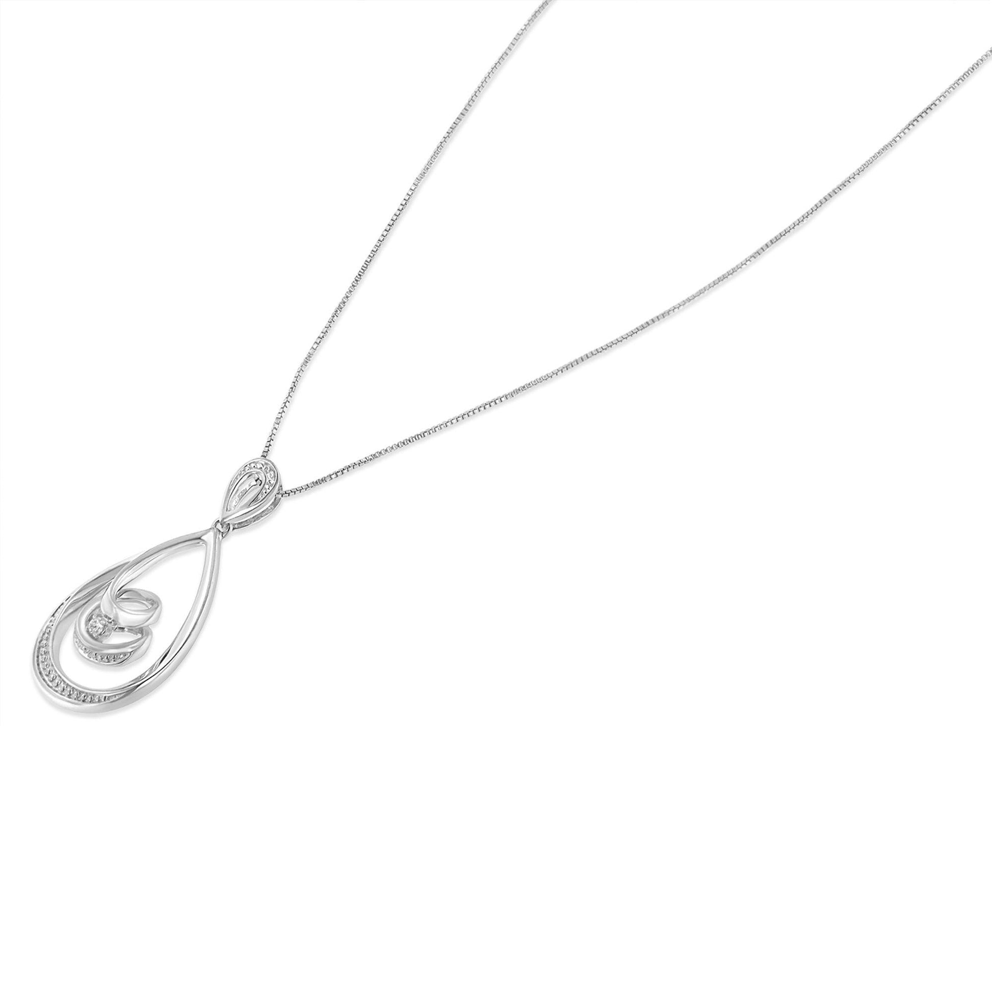 White metal necklace with a teardrop-shaped pendant featuring a central round white gemstone, shown at a slight angle on a white background.