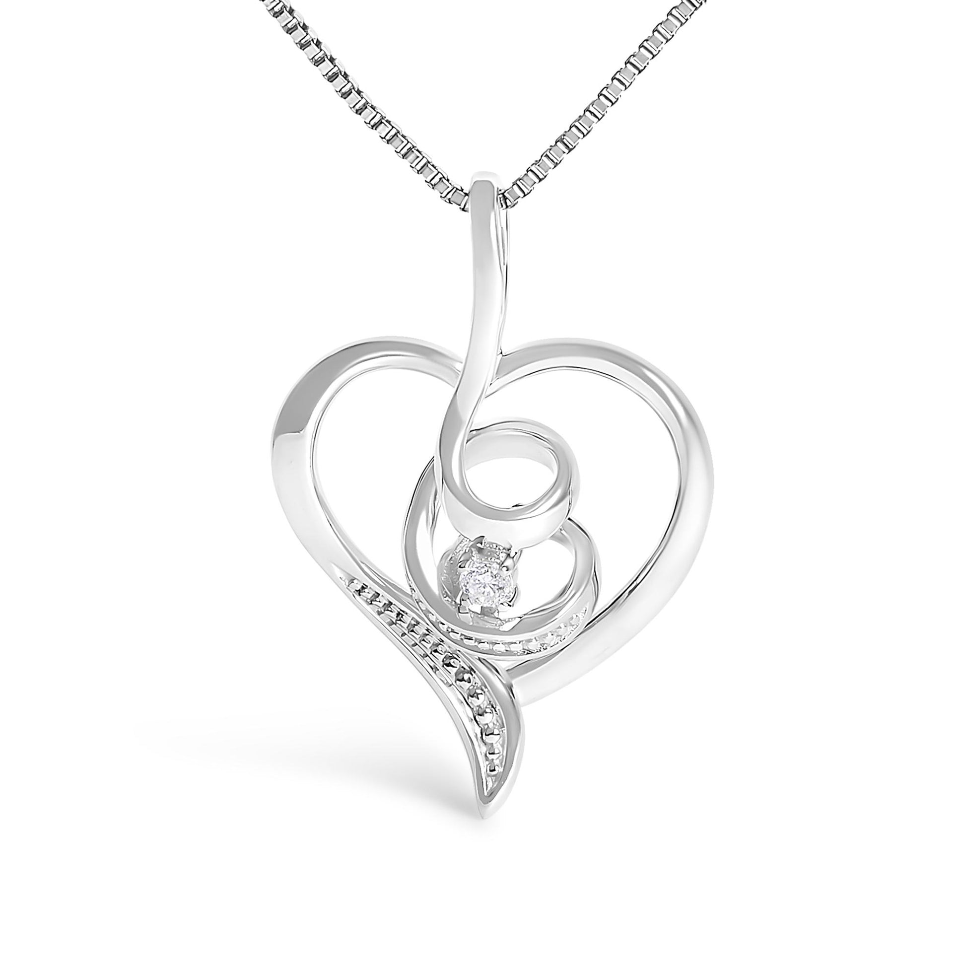 Close-up front view of a white metal heart-shaped necklace pendant with a swirl design, featuring one round prong-set white gemstone at the center.