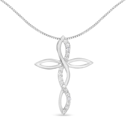 Front view of a white metal cross-shaped necklace pendant with an intertwined design, featuring round white gemstones in a prong setting along one strand.