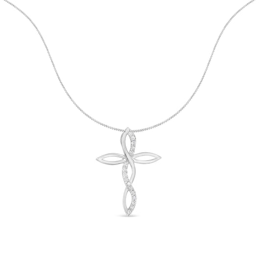 Front-facing shot of a white metal necklace with a cross pendant featuring openwork design and a twisting line set with white round gemstones.