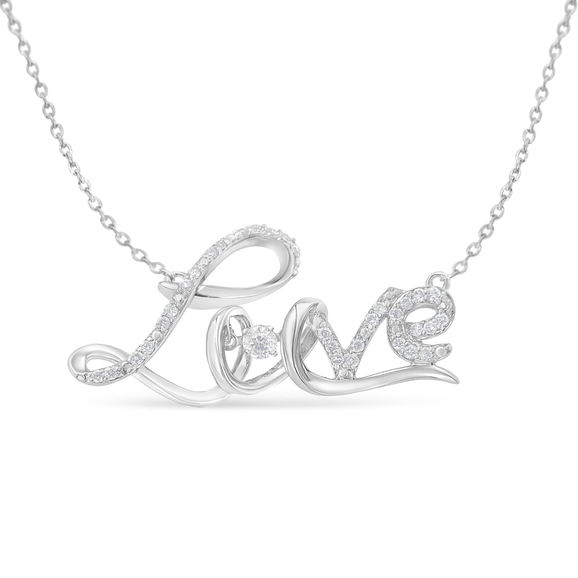 Close-up front view of a white metal necklace pendant spelling 'Love' adorned with multiple round white gemstones in prong settings on the letters, including one prominent round white gemstone inside the 'o'.