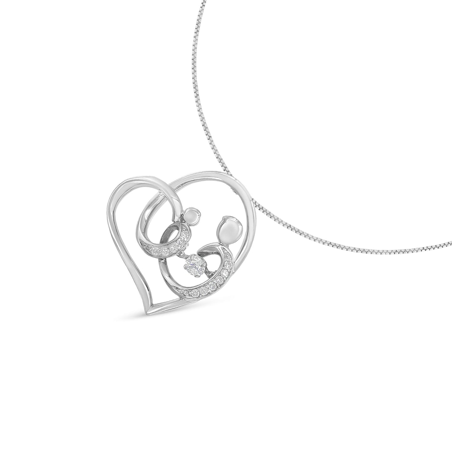 Front angle of a white metal heart-shaped necklace pendant featuring two abstract figures inside; one figure has an arched arm set with multiple small white gemstones, and a single white gemstone is suspended between them.