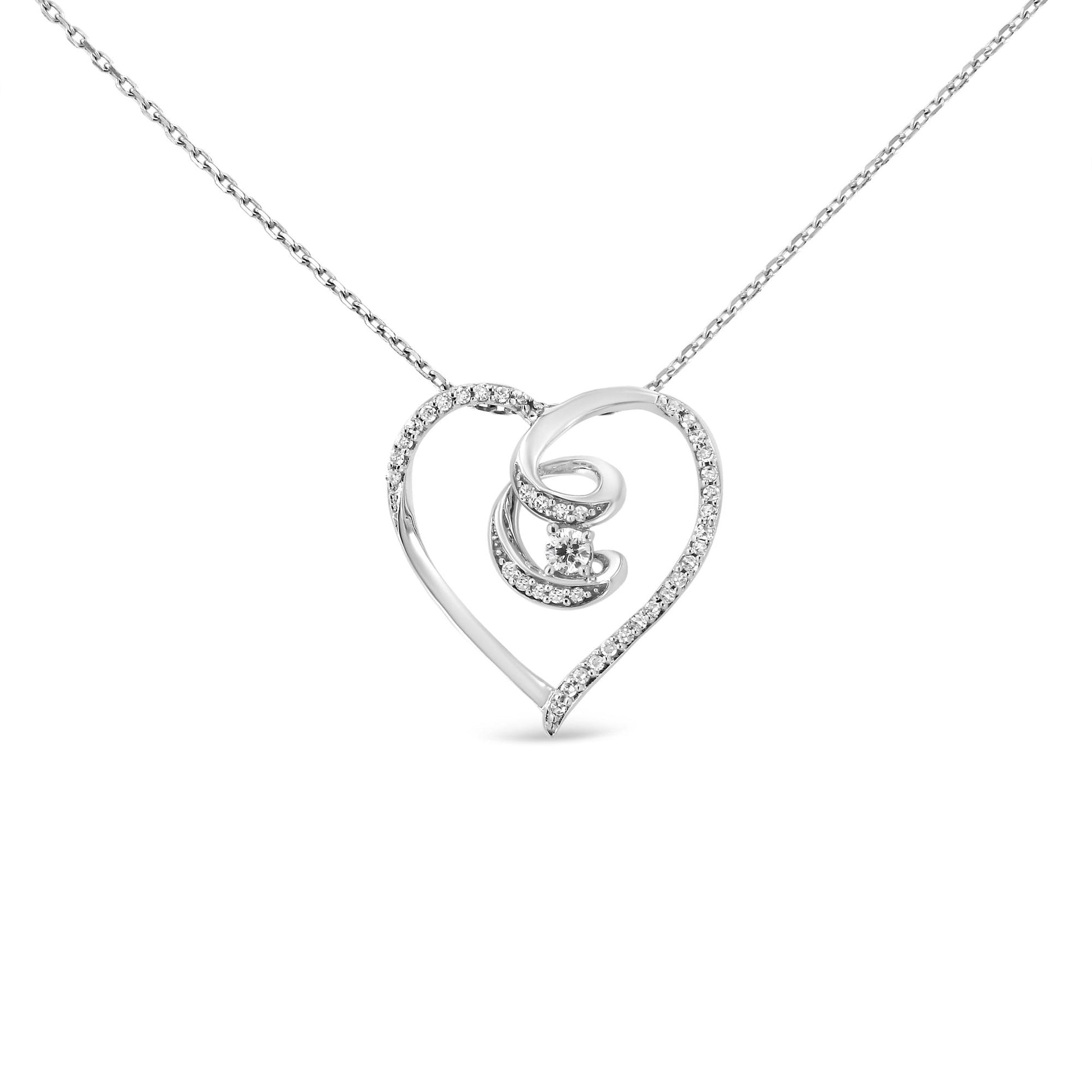 Front view of a white metal heart-shaped necklace pendant with a swirl design inside, accented with prong-set round white gemstones along the edges and a single larger gemstone in the center, on a matching chain.