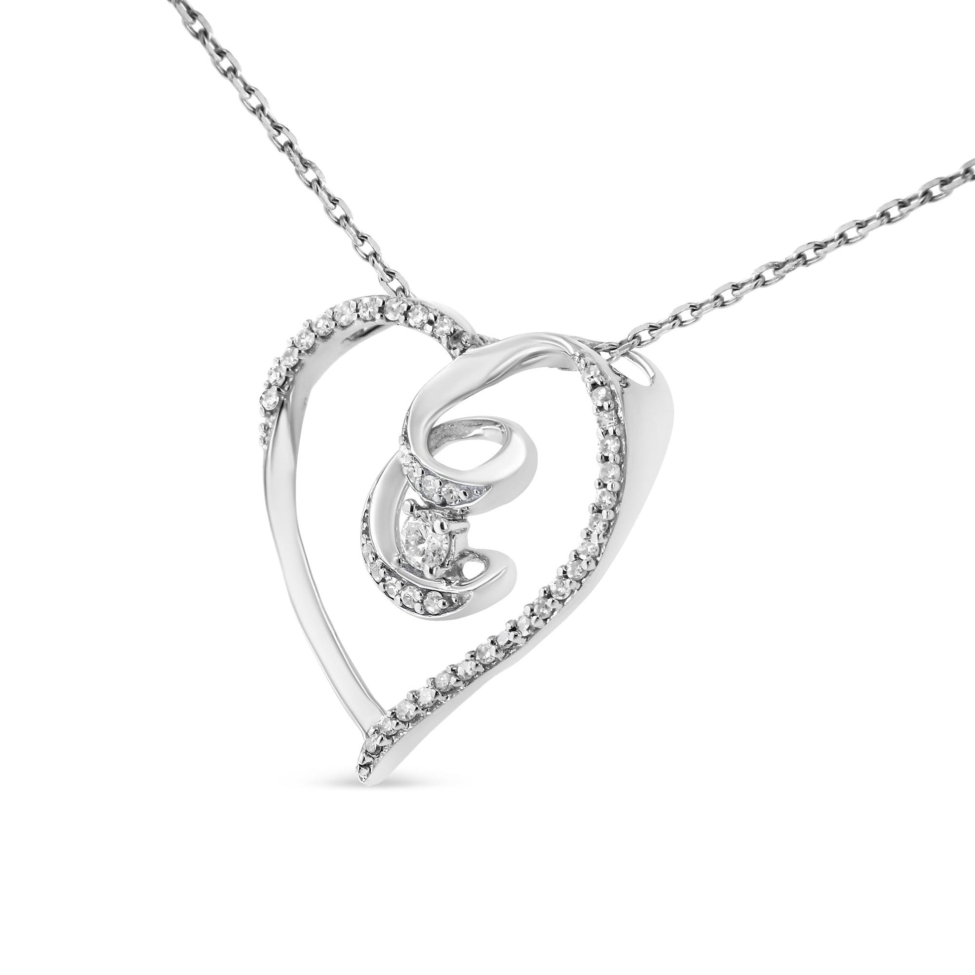Front angled view of a white metal heart-shaped necklace pendant with an open design, featuring a swirl inside adorned with a single white gemstone, surrounded by numerous small white gemstones along the heart outline.