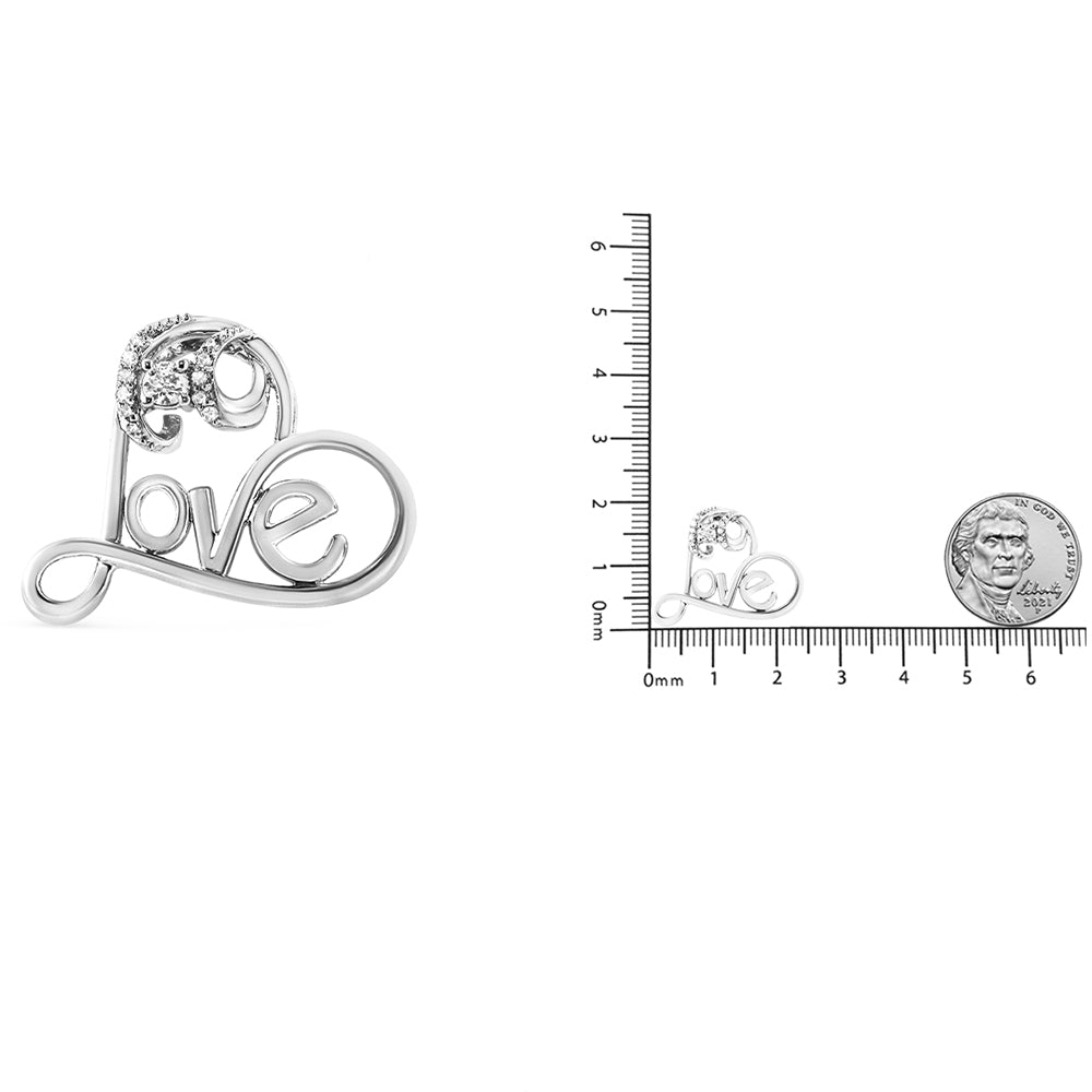 White metal necklace pendant with 'Love' script design, accented with round white gemstones in prong settings, shown from front angle; second image includes pendant placed next to ruler and coin for size reference.