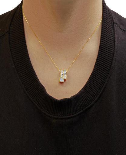 Yellow necklace with a pendant featuring white baguette-shaped gemstones in a channel setting and white princess-shaped gemstones in an invisible setting, worn on a model, front-facing angle.