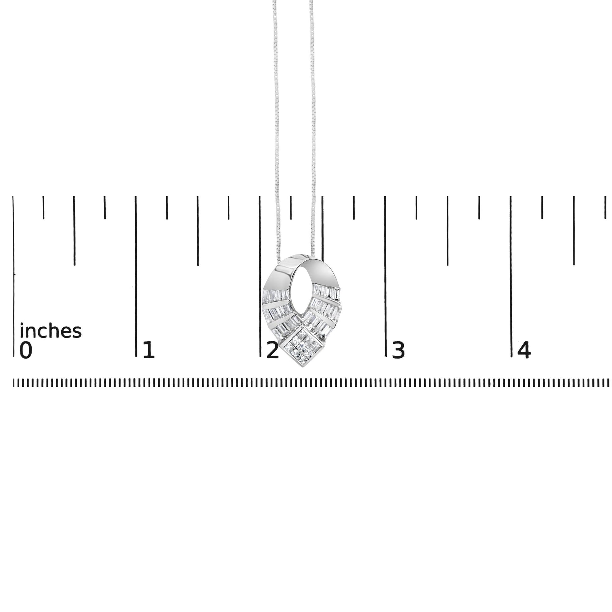 White metal necklace with a loop-shaped pendant featuring channel-set baguette white gemstones and a cluster of princess-shaped invisible-set white gemstones at the bottom, shown on a measuring scale from a front angle.