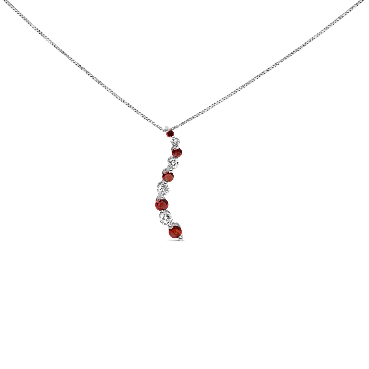 Front-facing shot of a white metal necklace with a curved pendant set with alternating round red and white gemstones in shared prong settings.