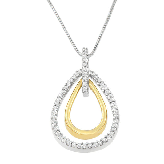 Front-facing close-up of a two-toned teardrop-shaped necklace pendant with an inner smooth yellow metal loop and an outer loop encrusted with round white gemstones in prong settings.