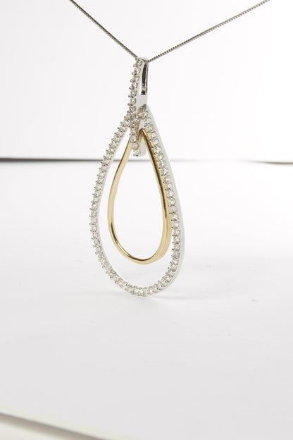 Close-up front angle of a two-toned teardrop-shaped necklace pendant with an outer edge adorned with white round prong-set gemstones and a smooth inner teardrop loop.