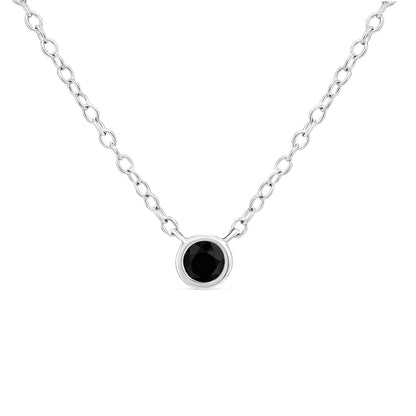Front view of white metal necklace with a round black gemstone in bezel setting on a chain.