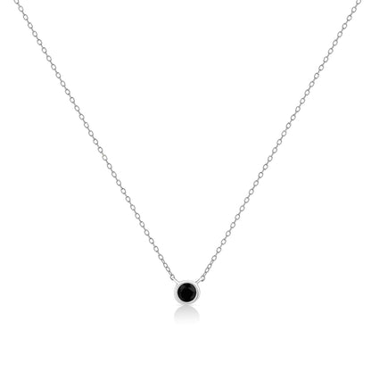 Front view of a white metal necklace with a single round black gemstone in a bezel setting pendant.