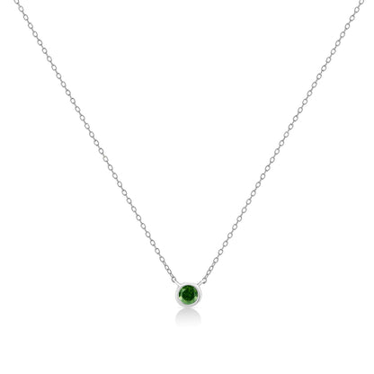 Front view of a white metal necklace with a round green gemstone in a bezel setting pendant.