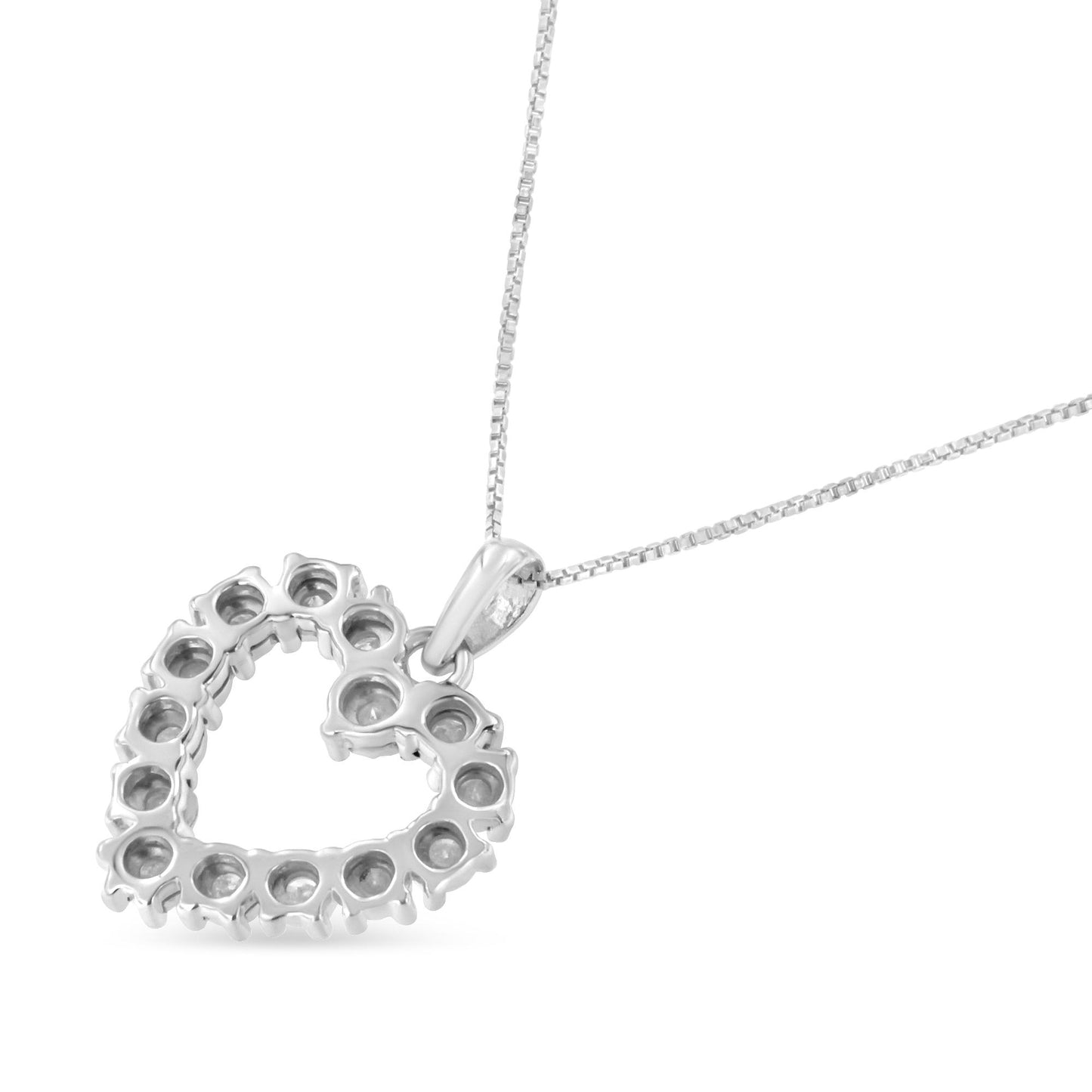 Close-up front angle of a white heart-shaped necklace pendant with settings for round white gemstones, on a white chain.