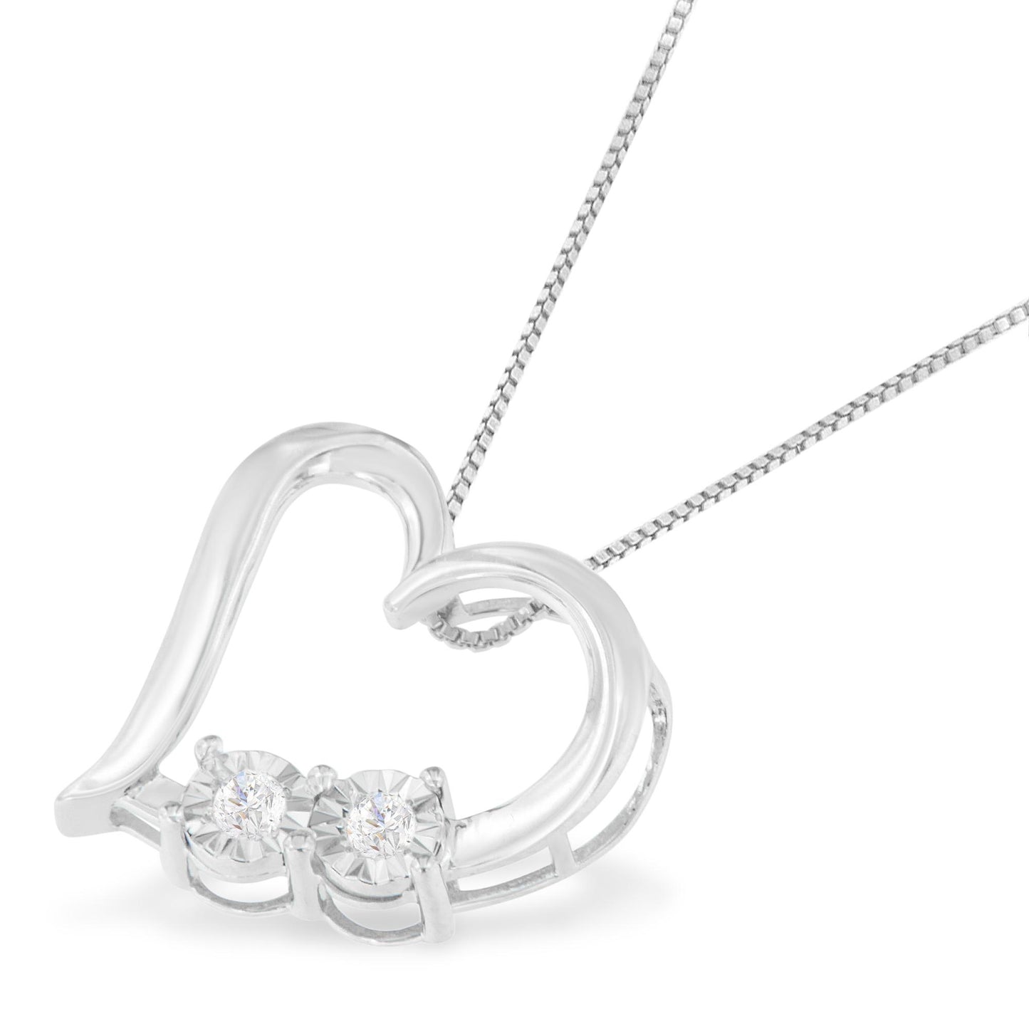 Close-up front angle of a white metal heart-shaped necklace pendant with two round white gemstones in miracle settings on a matching chain.
