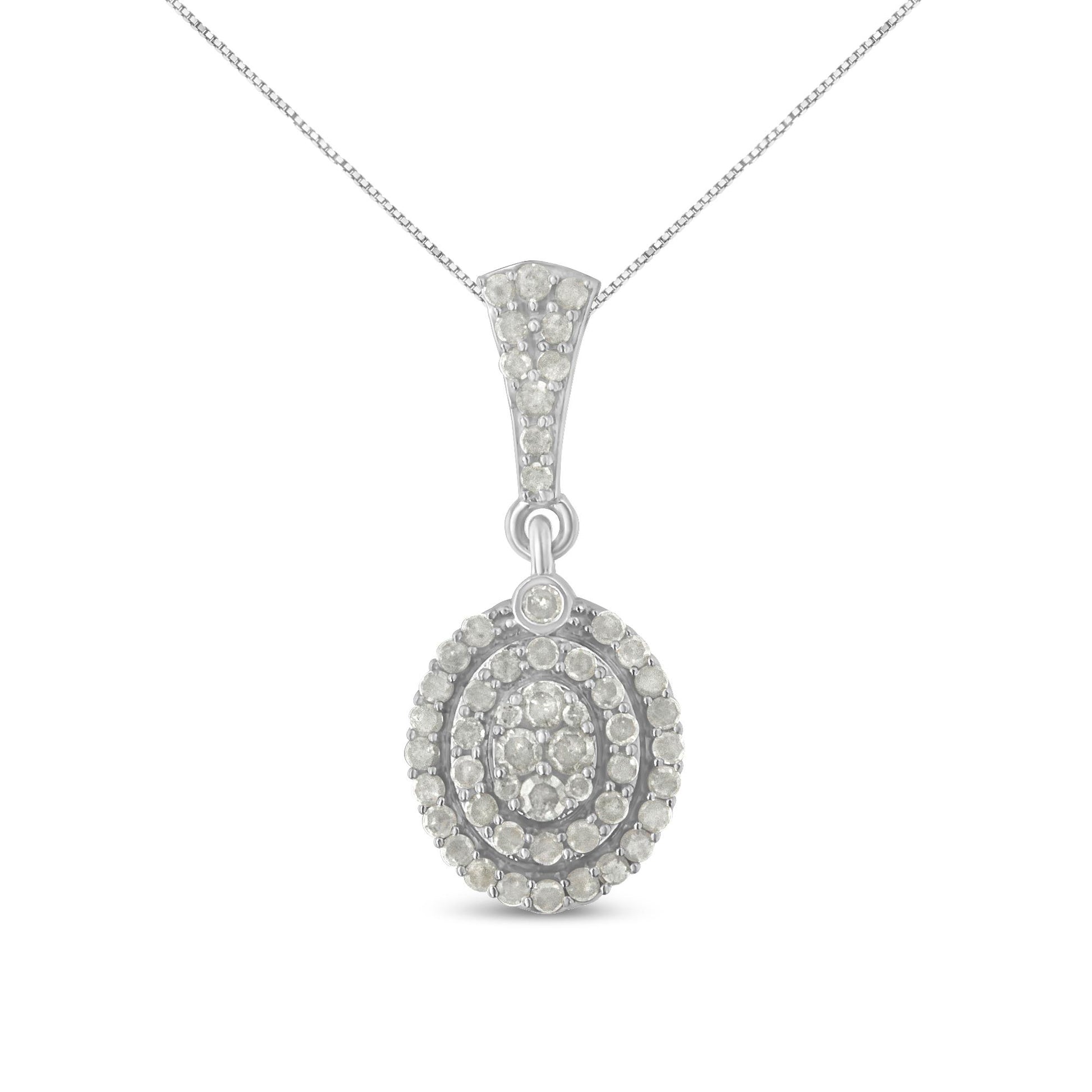 Front view of a white metal necklace with a round pendant set with multiple white round gemstones in prong settings.