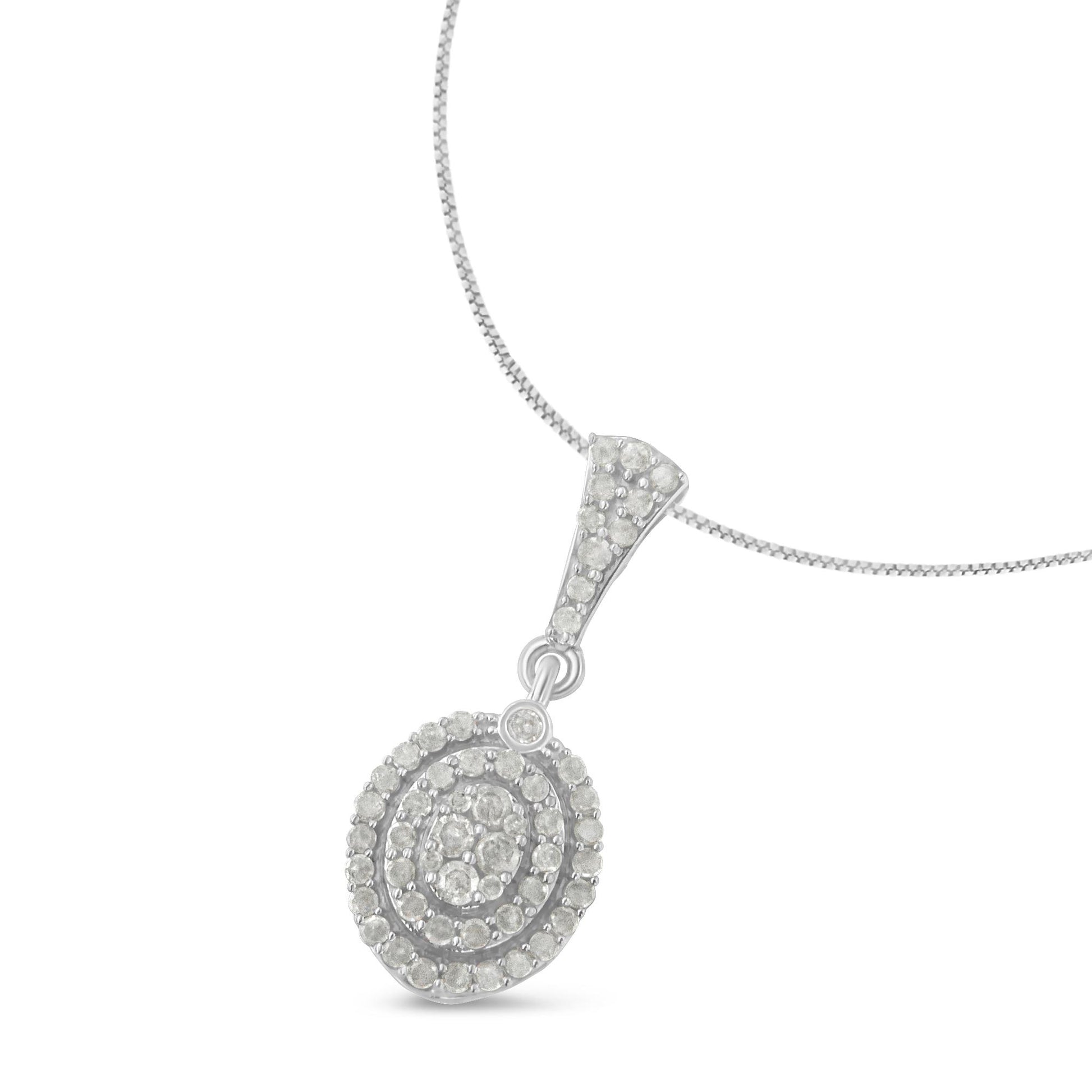 White metal necklace with a round pendant featuring multiple white round gemstones in prong settings, shown from a front angle.