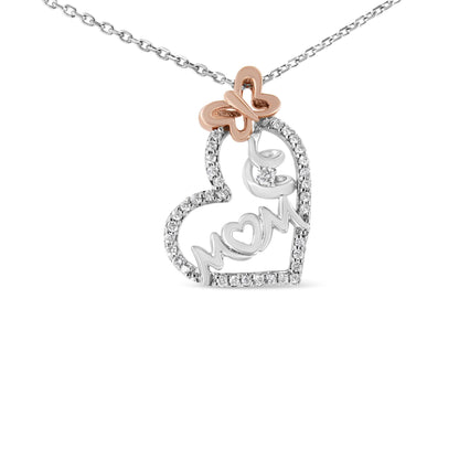 Front-facing view of a white and rose metal heart-shaped necklace pendant with a butterfly accent, outlined with white gemstones, and a 'MOM' script design inside the heart accented with white gemstones.