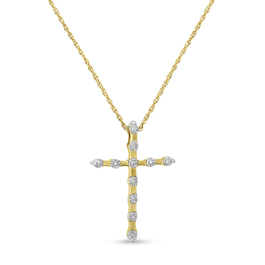 Front view of a yellow metal cross necklace pendant with round white gemstones in a miracle setting, hanging from a chain.
