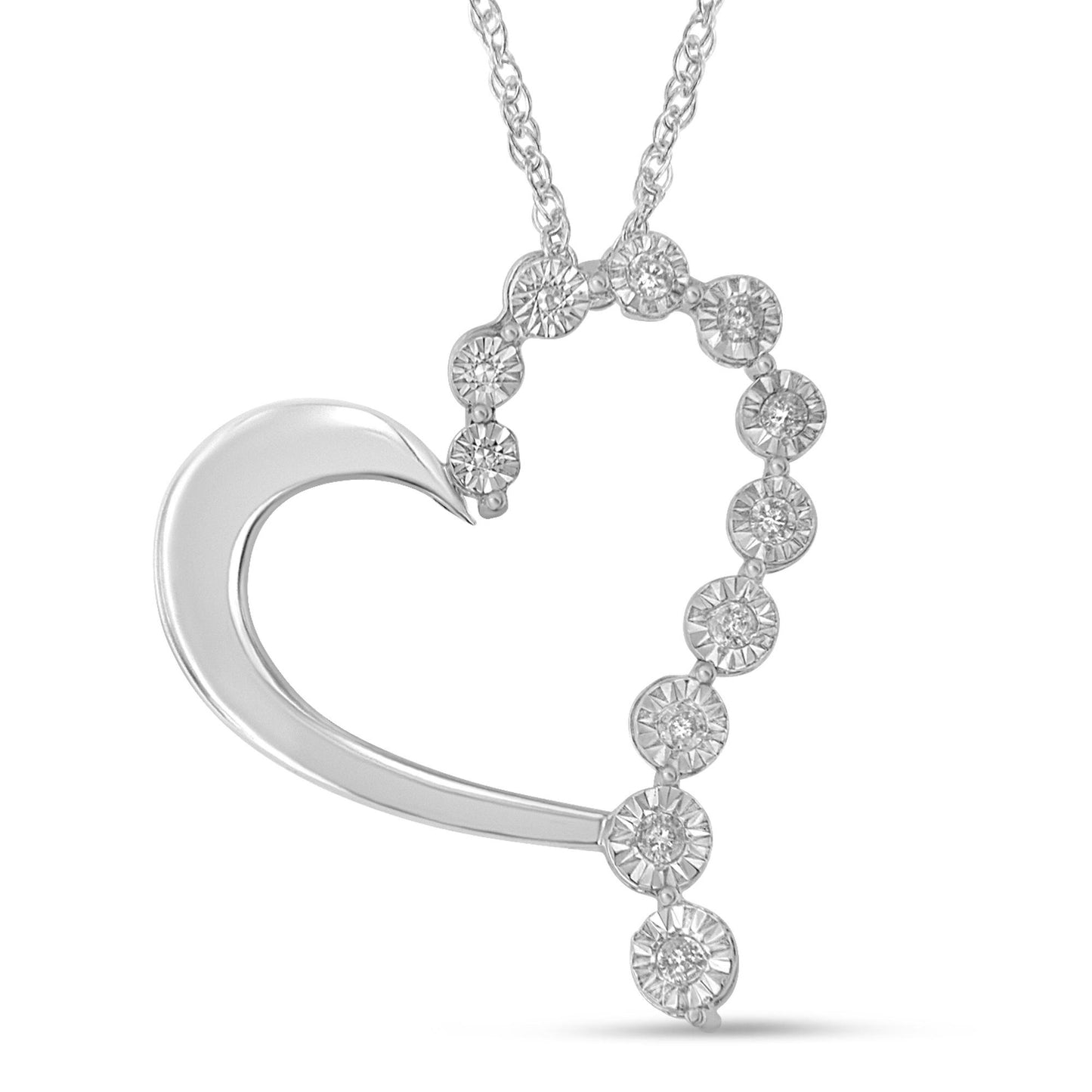 Close-up angled view of a white metal heart-shaped necklace pendant with round white gemstones set in a miracle setting along one side.