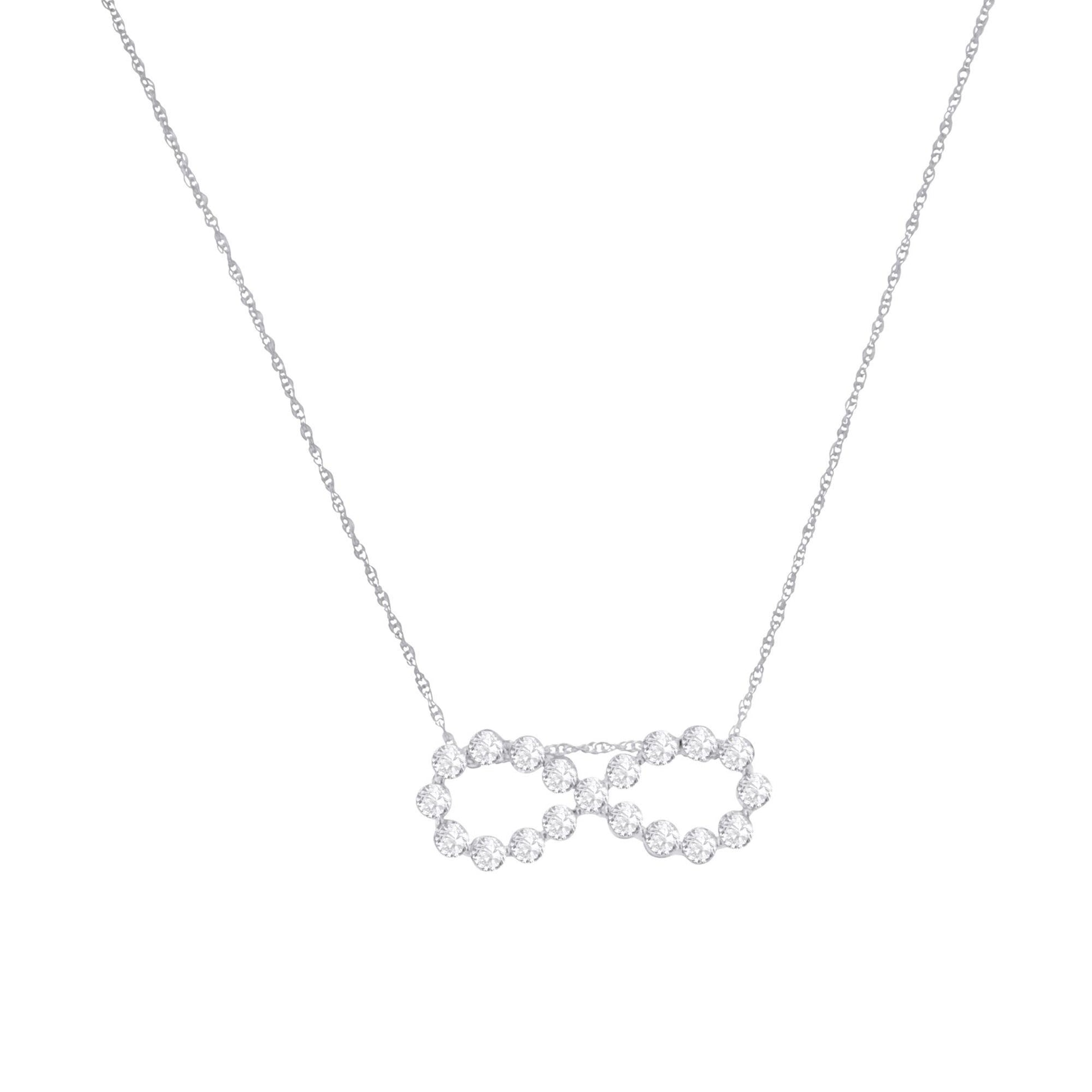 Front view of a white metal necklace with a pendant featuring two interlocking circles made of round white gemstones in miracle setting.