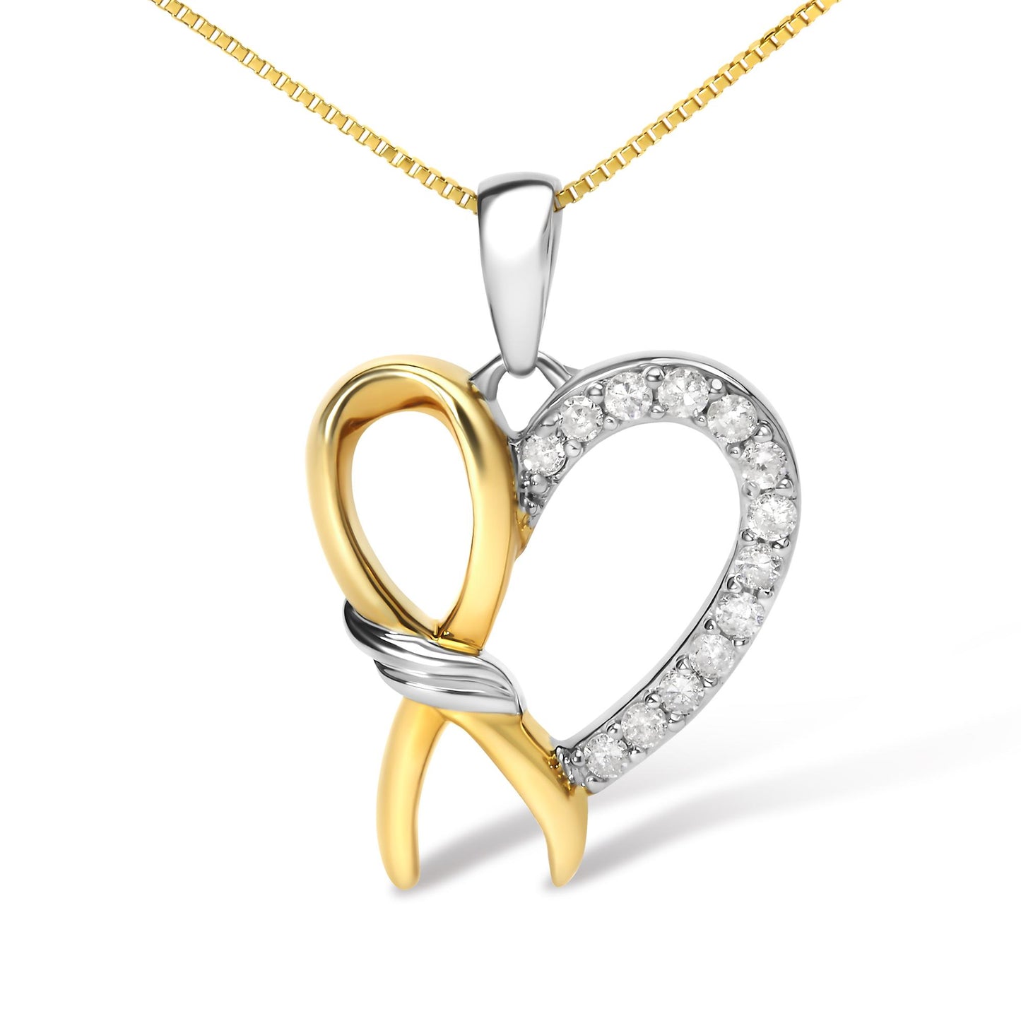 Close-up front angle of a two-tone heart-shaped necklace pendant with round white gemstones set along one side and a mixed metal ribbon design crossing at the center, hanging from a yellow chain.