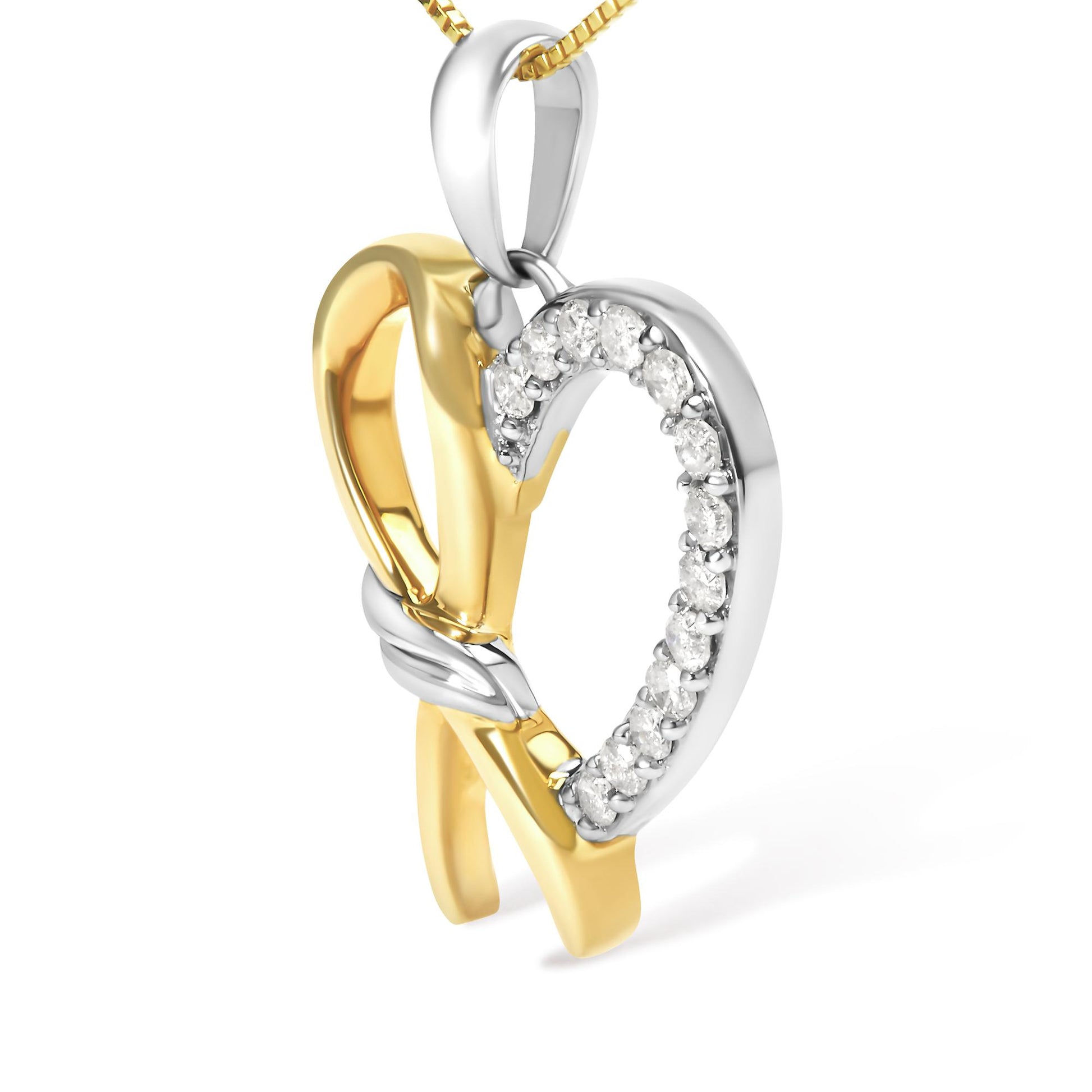 Close-up front angle view of an interlocked heart-shaped necklace pendant with yellow and white metal tones, featuring a white gemstone-studded outline on one heart and a smooth polished finish on the other.