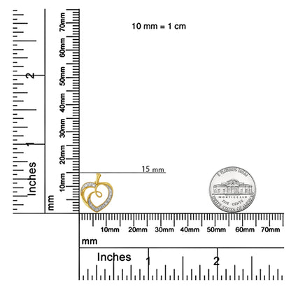Close-up angled shot of a yellow heart-shaped necklace pendant with white round-shaped gemstones in prong settings, displayed on a ruler and scale for size reference.