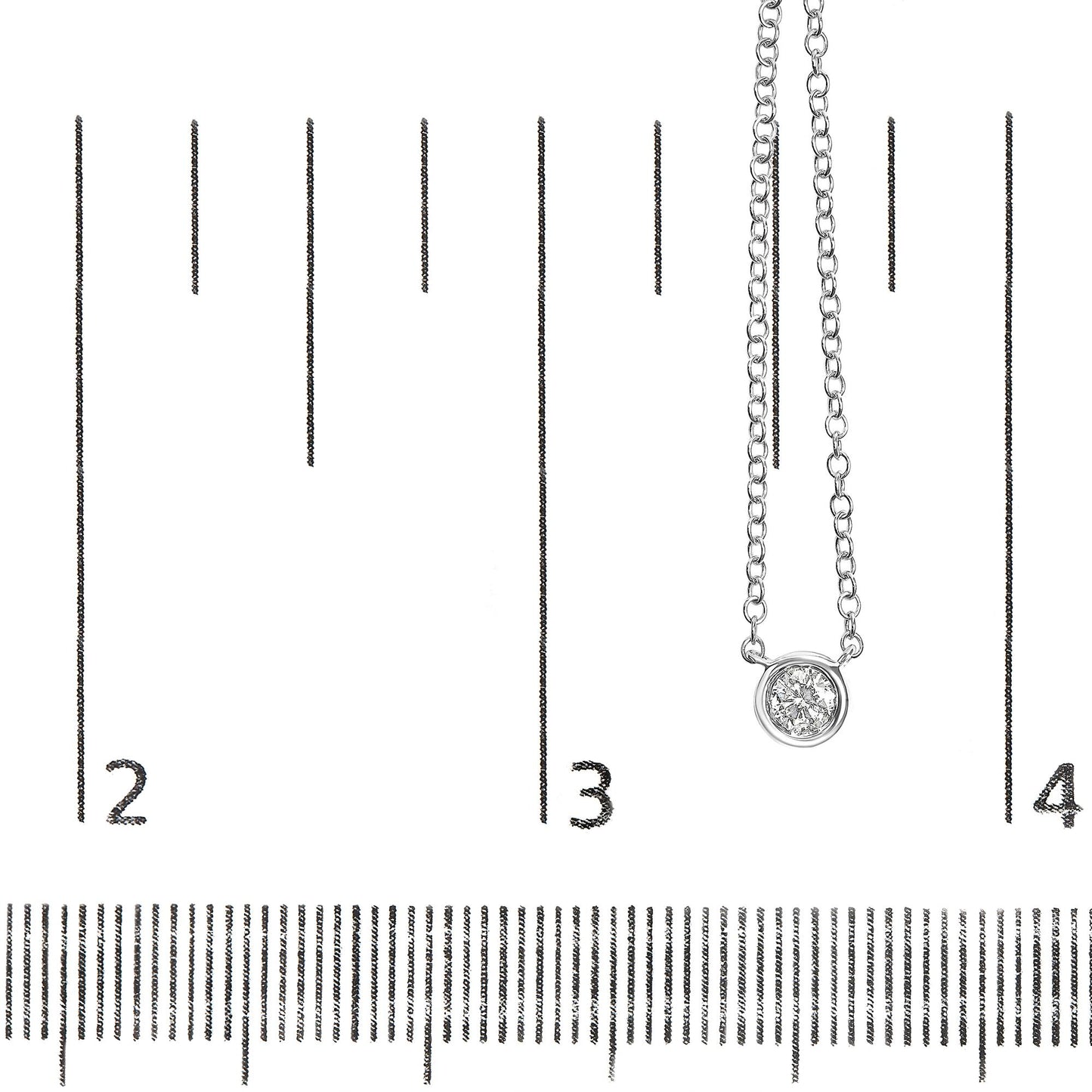 Close-up front angle of a white metal necklace with a round white gemstone in bezel setting, displayed on a ruler for size reference.