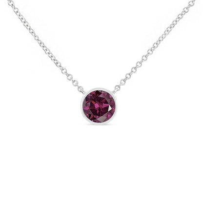 Close-up front view of a white metal necklace with a bezel-set round purple gemstone pendant.