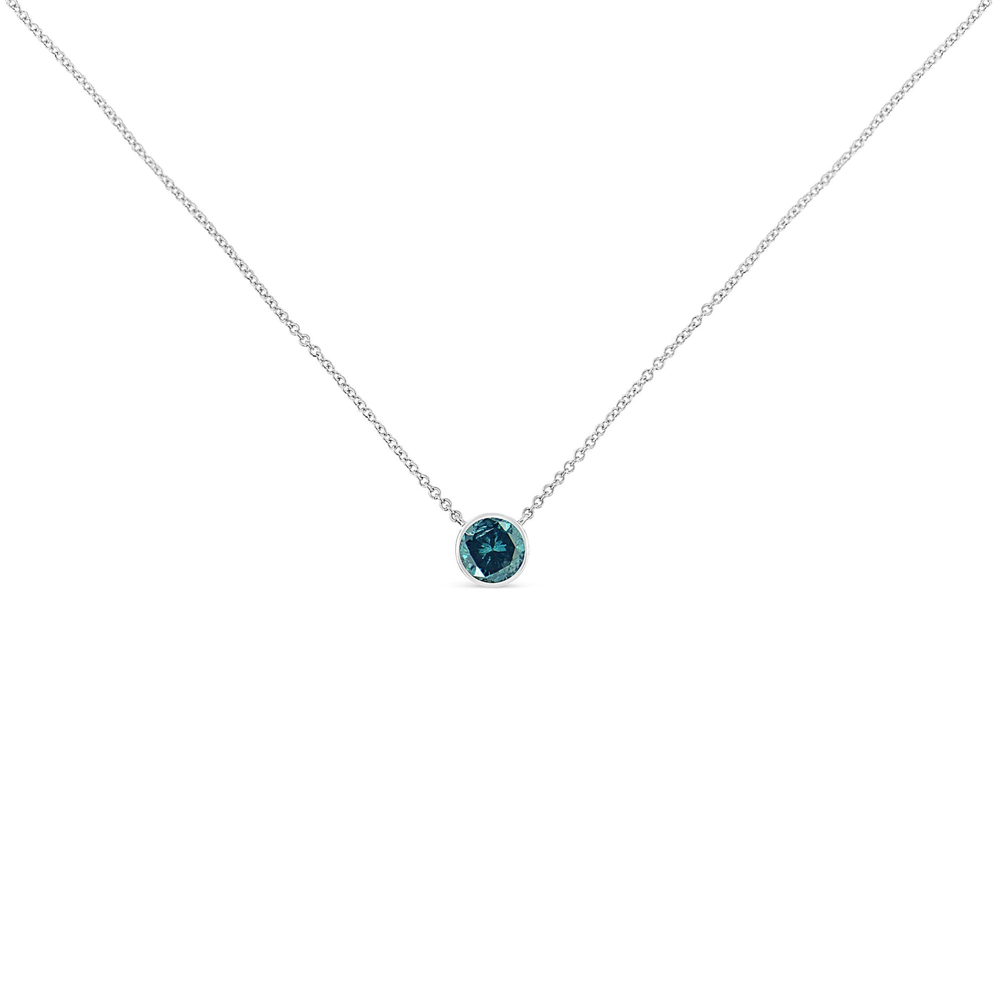 Front view of a white metal necklace with a single round blue gemstone in a bezel setting.