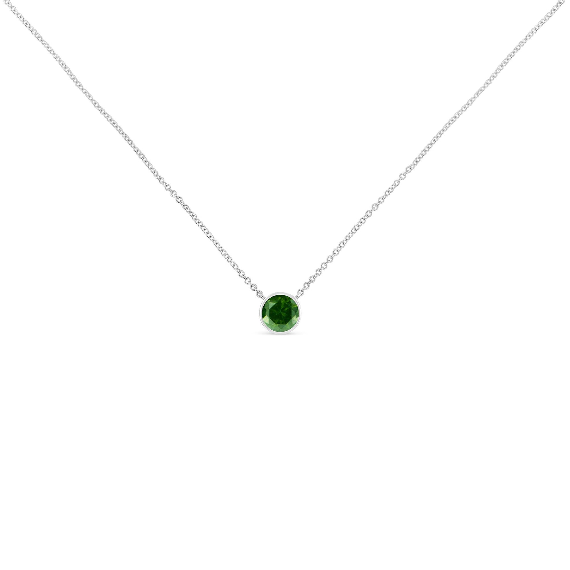 Front view of a white metal necklace with a round green gemstone in a bezel setting as the pendant.