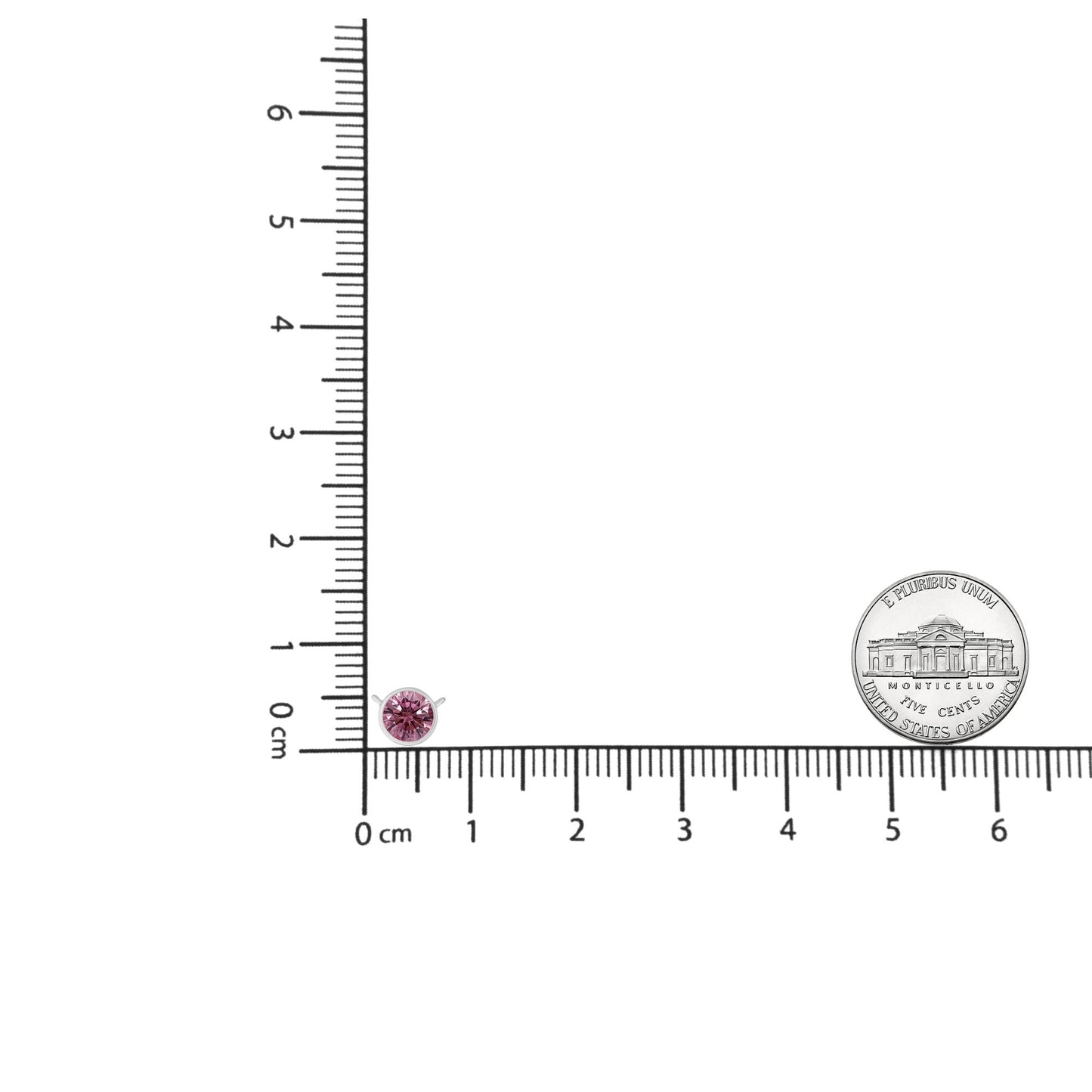 White necklace with a round pink gemstone in bezel setting, shown on a ruler for size reference, top-down angle.