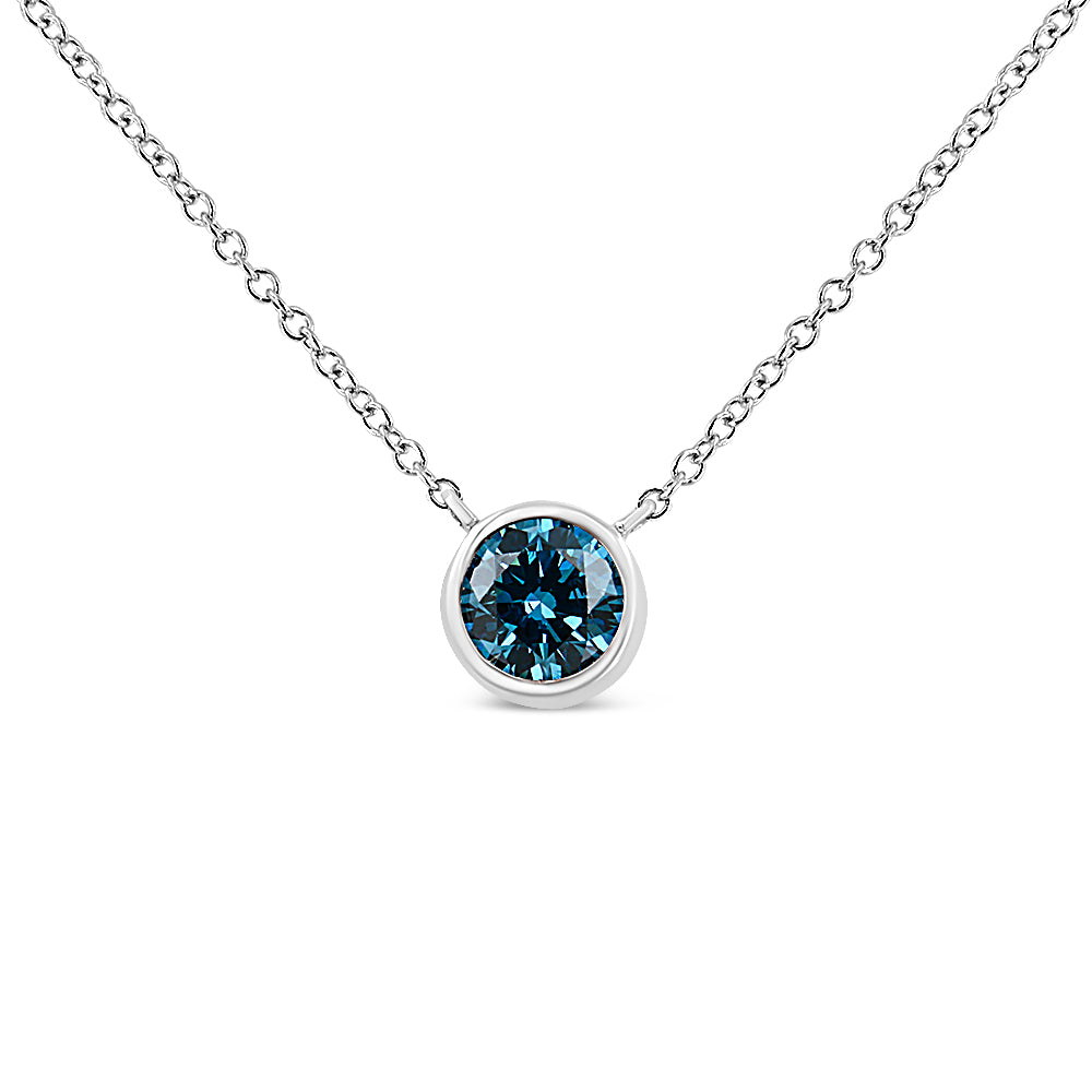 Close-up front view of a white metal necklace with a round blue gemstone in a bezel setting.
