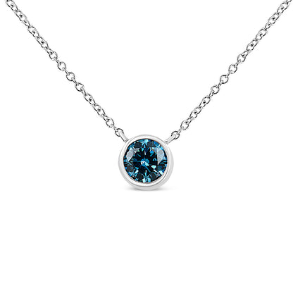Close-up front view of a white metal necklace with a round blue gemstone in a bezel setting.