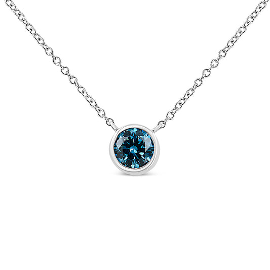 Close-up front view of a white metal necklace with a round blue gemstone in a bezel setting.