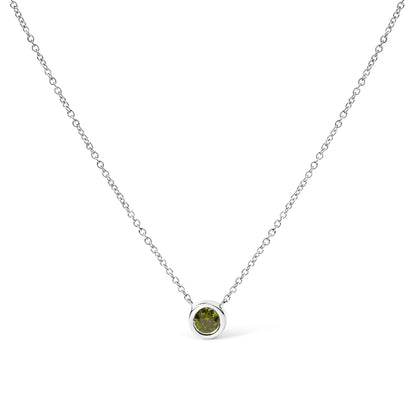 White necklace with a round green gemstone in a bezel setting, shown from the front on a white background.