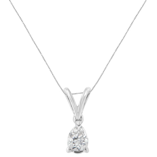 Front angle view of a white metal necklace with a pear-shaped white gemstone in a prong setting.