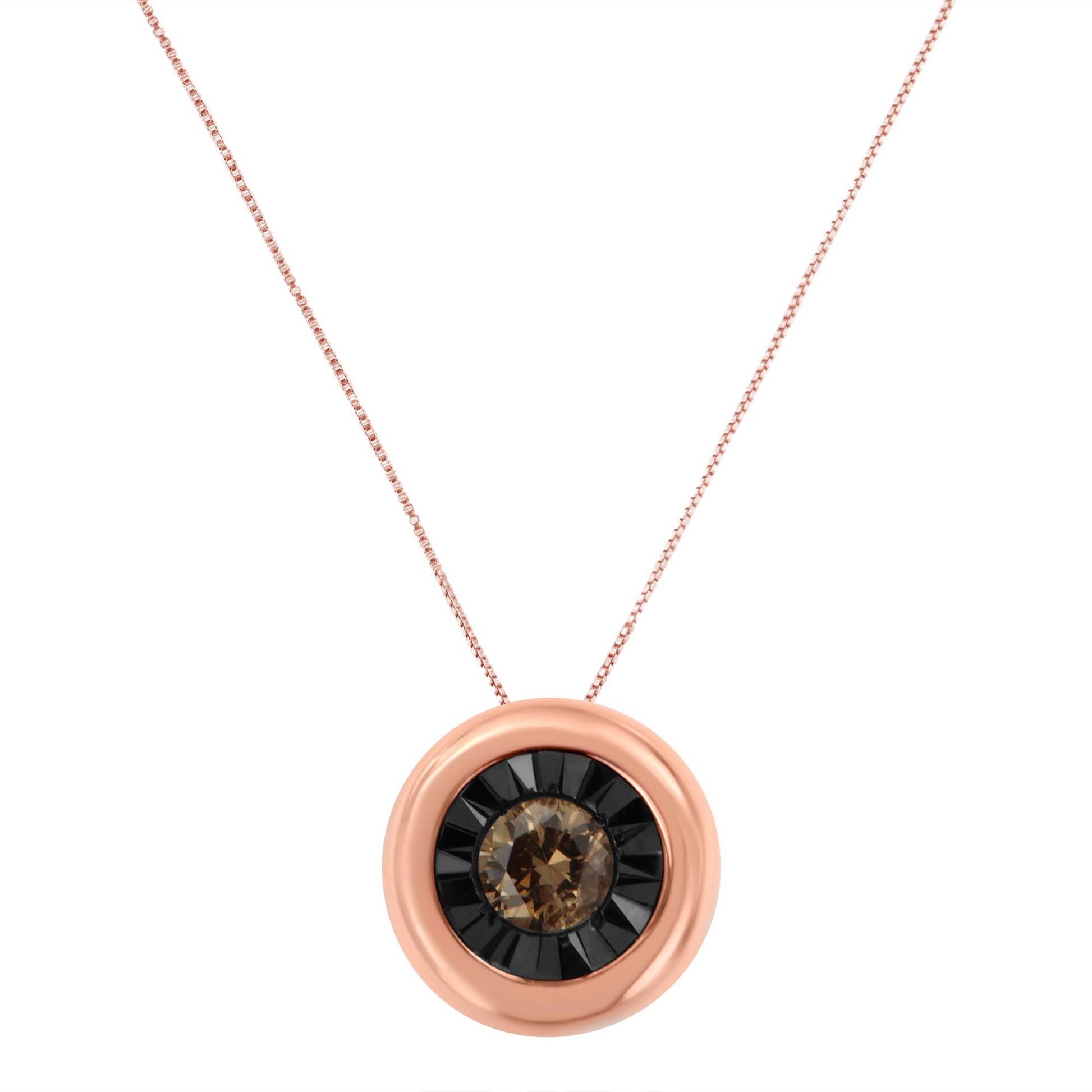 Front view of a rose metal necklace with a circular pendant featuring a central round champagne-colored gemstone surrounded by smaller black gemstones.