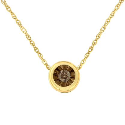 Front view of a yellow metal necklace with a round pendant featuring a centrally set brownish round gemstone in a miracle setting.
