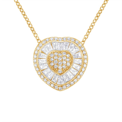 Front-facing shot of a yellow metal heart-shaped necklace pendant with white round prong-set gemstones in the center and an outer layer of white baguette channel-set gemstones surrounded by a border of white round prong-set gemstones, on a yellow chain.