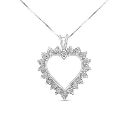 Front-facing image of a white metal heart-shaped necklace pendant with round white gemstones in a miracle setting around the perimeter.