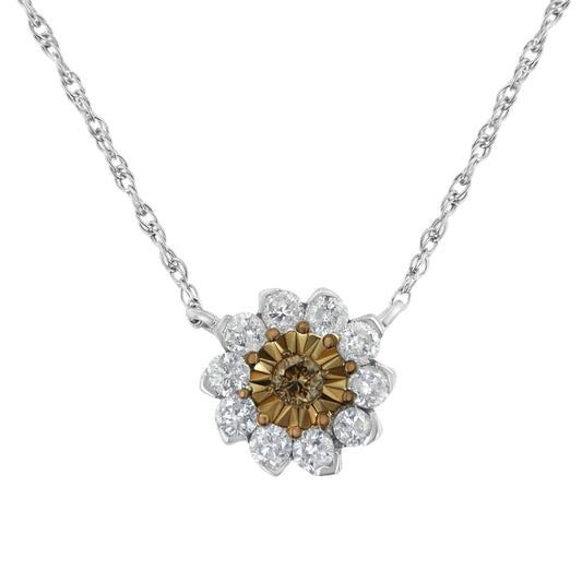 Front angle close-up of a two-toned necklace with a flower-shaped pendant featuring a central round champagne gemstone in a miracle setting, surrounded by multiple round white gemstones in an invisible setting.